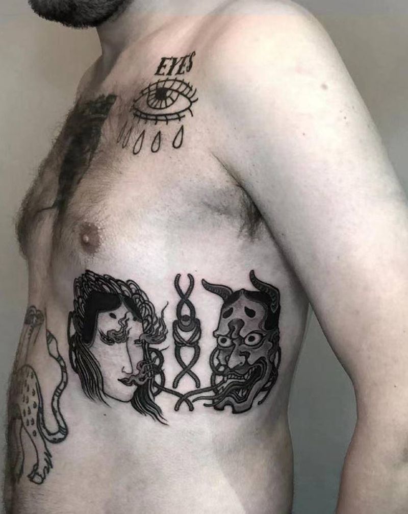 面具纹身图片_腰部老传统纹身图案